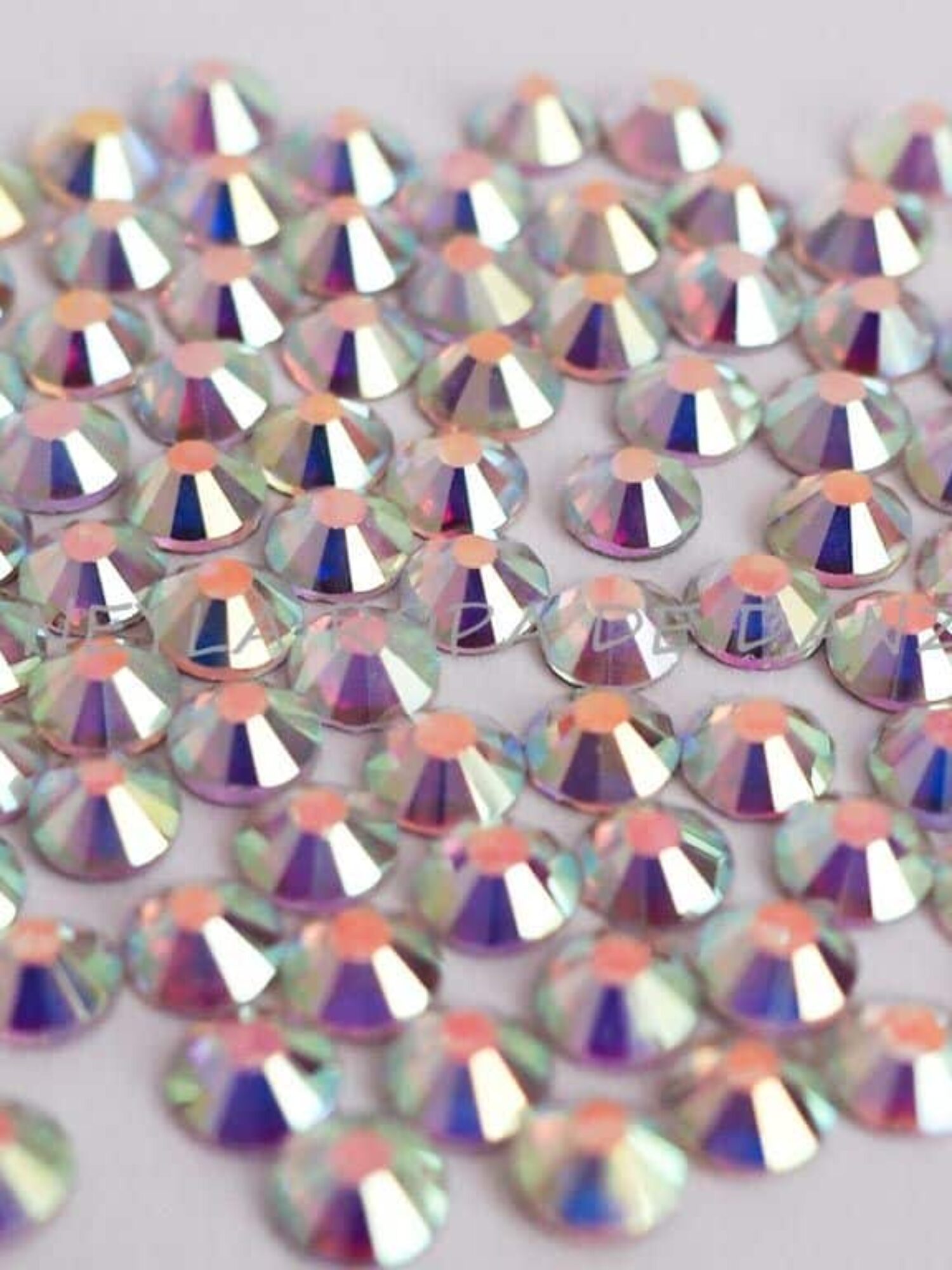 Small Aurora Borealis rhinestones SS30 for dance costumes.