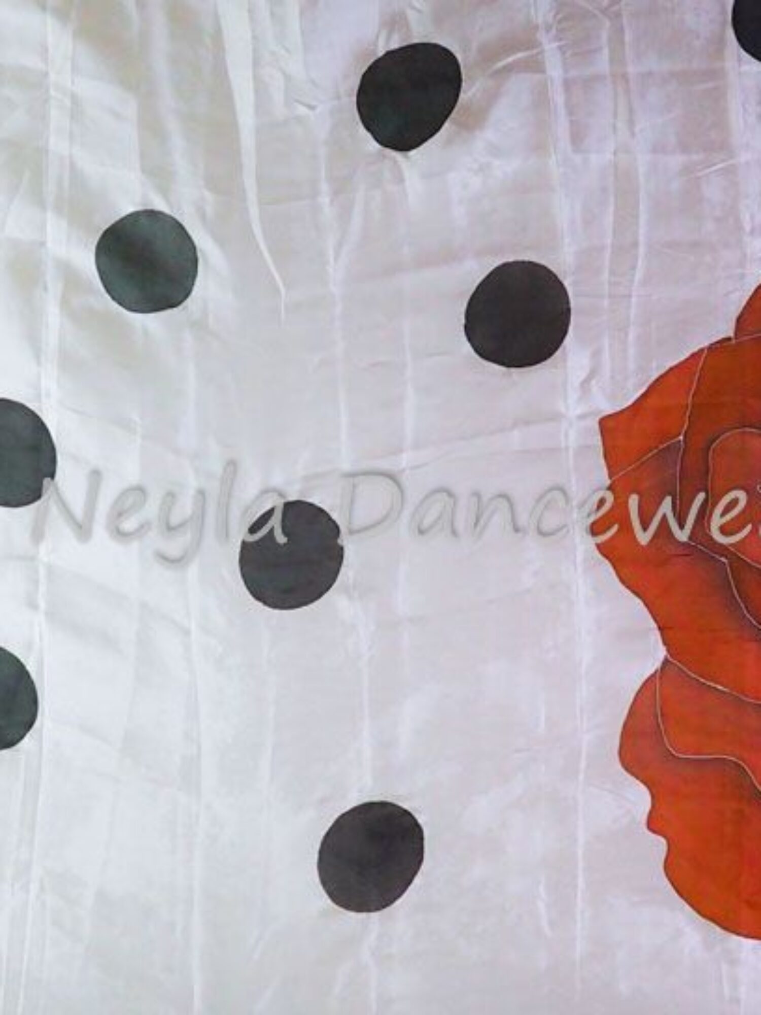Hand-painted silk veil with black polka dots and a red rose on the side.