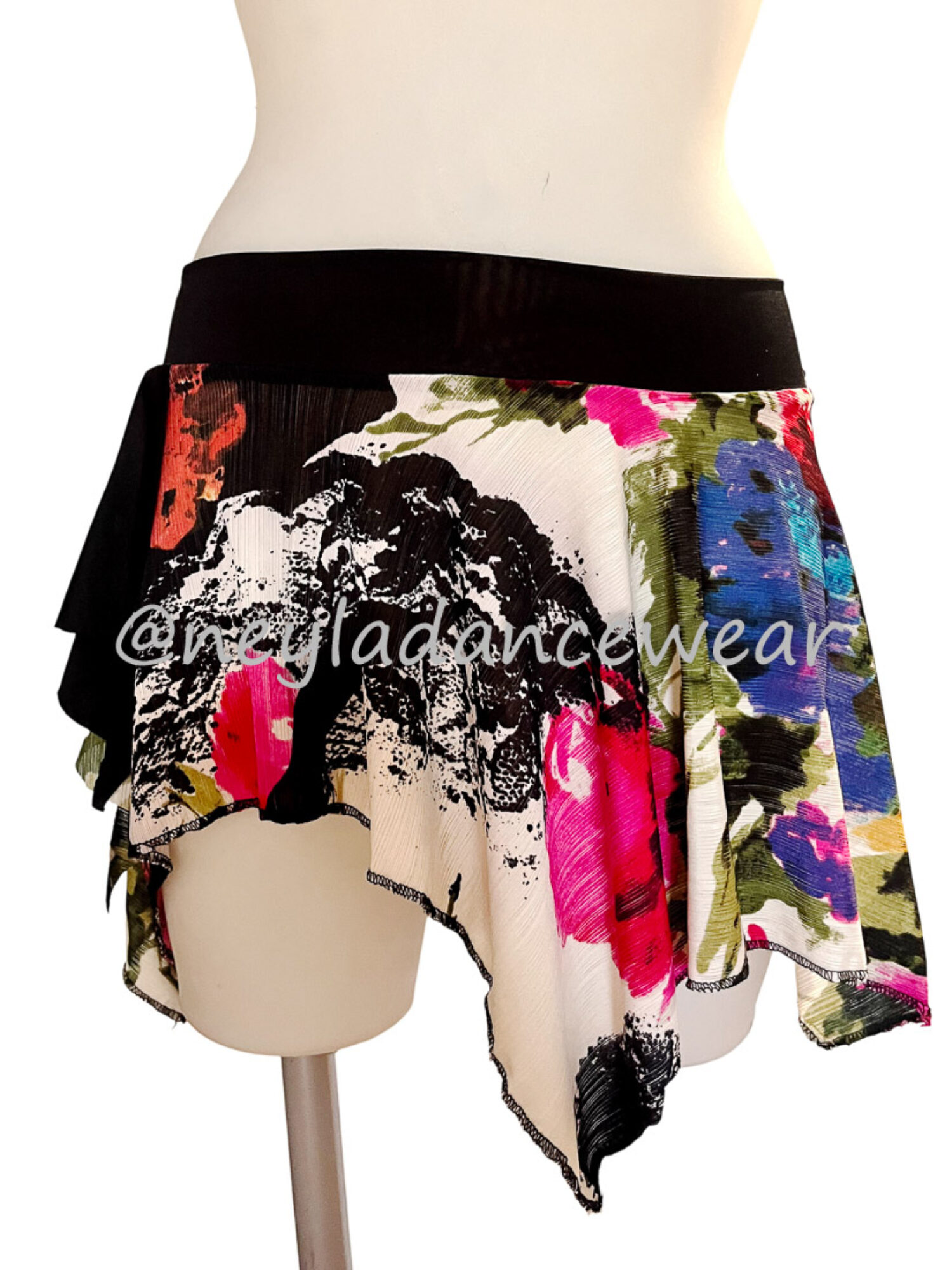 Falda Fatma asimétrica con estampado floral multicolor para danza del vientre.